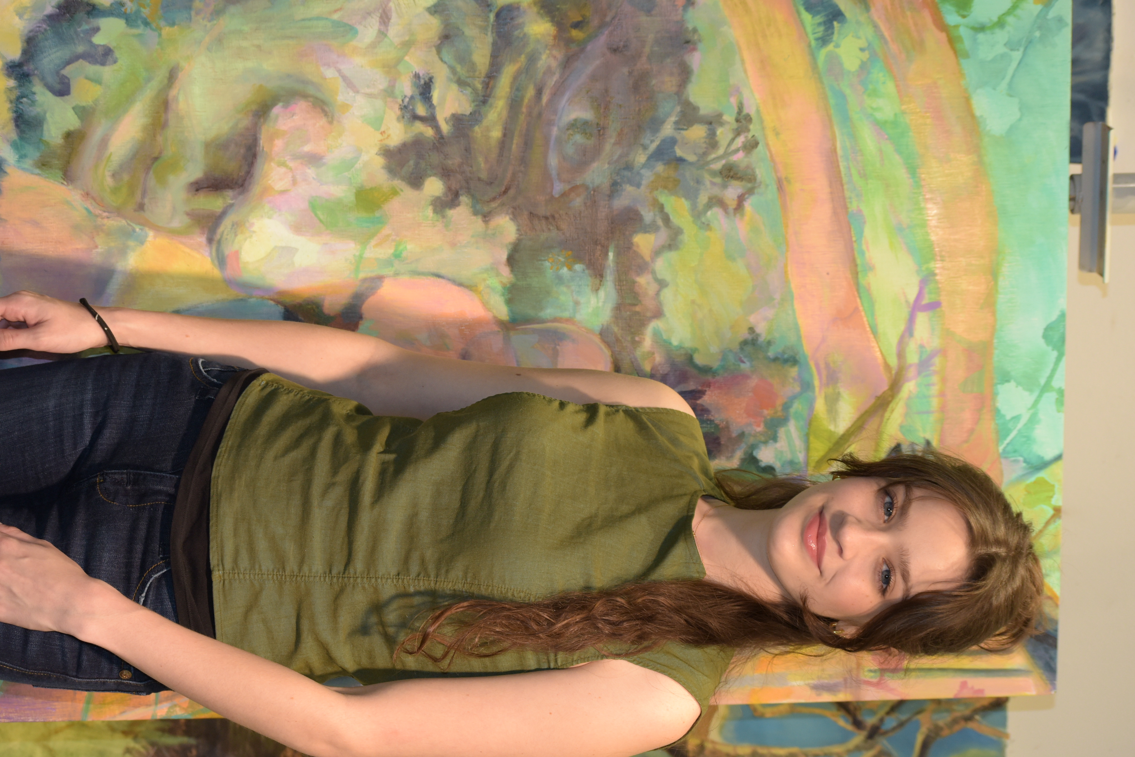 Mya Hayes with one of her large paintings